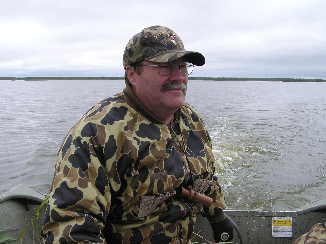 John Williams boats across Thief Lake a few years ago "with less gray hairs" during a duck hunt at Thief Lake Wildlife Management Area near Middle River, Minn. Williams, an Indiana native who began his career with the Minnesota Department of Natural Resources at Thief Lake WMA, retired Tuesday, Aug. 3, as Northwest Region 1 wildlife manager for the Minnesota DNR in Bemidji. (Contributed/ John Williams)